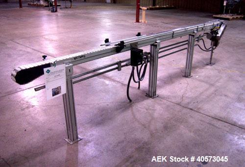 Used Flex Link Conveyor. 3 1/4" wide x 120" long plastic belt. Driven by a 1/3 hp, 90 volt, 1750 rpm DC gearmotor, ratio 20 to 1. Includes a  variable speed controller. Mounted on an aluminum frame w...