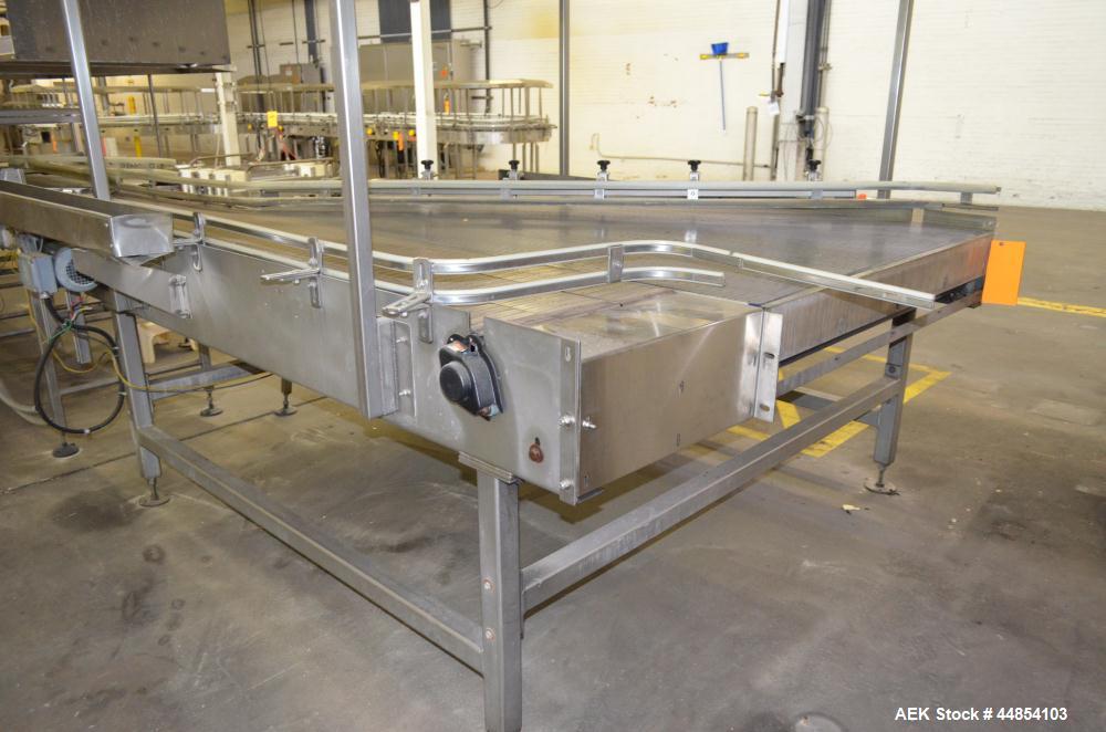 Used Table Top Belt Conveyor. Approximately 4" wide x 1500” long, partial belt.  Stainless steel frame.  Includes (9) turns, (11) gear motors.  (2) Sections of multiple belt accumulation tables.