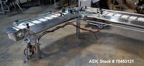 Used Advantage 90 Degree Table Top Belt Conveyor spproximately 7" wide x 112" long into a 90 degree x 38" long belt. Has motor and controller. Mounted on a stainless steel frame. Built 2002. SELLING ...
