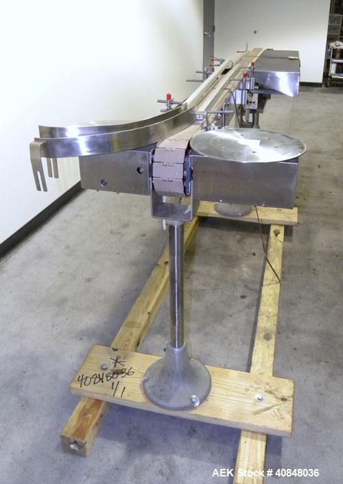 Used Anderson Machine Systems Table Top Conveyor. 3 1/4" wide x 126" long plastic belt. Driven by a 1/2 hp, 90 volt, 1725 rpm gearmotor, ratio 30 to 1. Includes a Spartan speed controller. Mounted on...