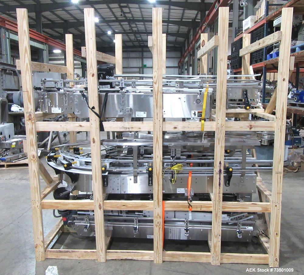 Unused Arrowhead Line Conveyor with Gripper Air Lowerator Rinser. Has Nema 4X HBLDS3AC local motor safety disconnects and Septimatech guide rails.