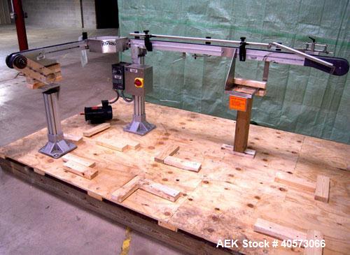Used Flex Link Conveyor. 3 1/4" wide x 32" long section x 70" long section x 90 degree center turn. Driven by a 3/4 hp, 90 volt, 1725 rpm motor. Includes a Reliance VS drive. Mounted on an aluminum f...