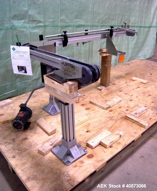 Used Flex Link Conveyor. 3 1/4" wide x 32" long section x 70" long section x 90 degree center turn. Driven by a 3/4 hp, 90 volt, 1725 rpm motor. Includes a Reliance VS drive. Mounted on an aluminum f...