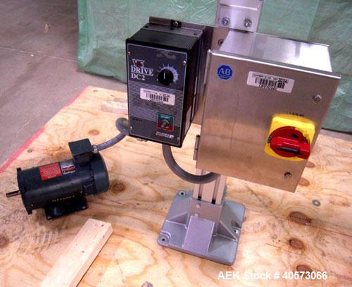 Used Flex Link Conveyor. 3 1/4" wide x 32" long section x 70" long section x 90 degree center turn. Driven by a 3/4 hp, 90 volt, 1725 rpm motor. Includes a Reliance VS drive. Mounted on an aluminum f...