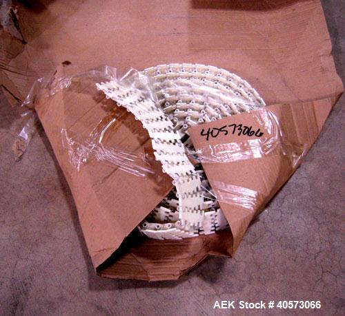 Used Flex Link Conveyor. 3 1/4" wide x 32" long section x 70" long section x 90 degree center turn. Driven by a 3/4 hp, 90 volt, 1725 rpm motor. Includes a Reliance VS drive. Mounted on an aluminum f...