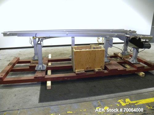 Used Flexlink "U" Shaped Table Top Belt Conveyor. 4" Wide plastic belt. (1) 86" long straight section, (1) 148" long straight section, (1) 144" long U section, (1) 24" long drive section. 1/2 hp, 3/6...