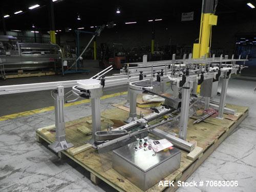 Used Flexlink Model XH (103mm) Industial Flexible Conveyor.. Last handling 3" diameter pharmaceutical grade plastic bottles. 3.25" Flexlink plastic chain, aluminum extruded frames, 6 sections: 45"/90...