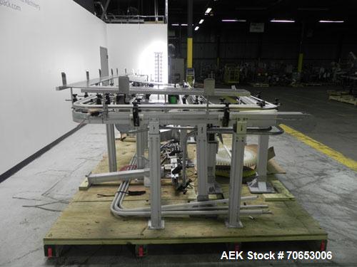 Used Flexlink Model XH (103mm) Industial Flexible Conveyor.. Last handling 3" diameter pharmaceutical grade plastic bottles. 3.25" Flexlink plastic chain, aluminum extruded frames, 6 sections: 45"/90...