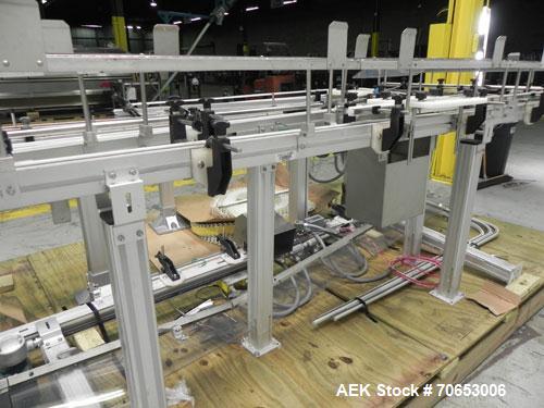 Used Flexlink Model XH (103mm) Industial Flexible Conveyor.. Last handling 3" diameter pharmaceutical grade plastic bottles. 3.25" Flexlink plastic chain, aluminum extruded frames, 6 sections: 45"/90...