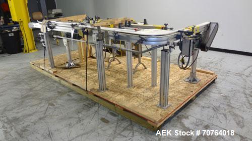 Used Flexlink 20 Conveyor. Counterclock with 10" radius. 3-1/4" flexible belt. 3-1/4" Delrin tabletop chain.