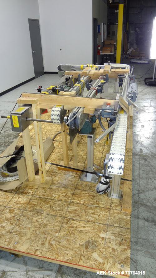 Used Flexlink 20 Conveyor. Counterclock with 10" radius. 3-1/4" flexible belt. 3-1/4" Delrin tabletop chain.