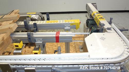 Used Flexlink 20 Conveyor. Counterclock with 10" radius. 3-1/4" flexible belt. 3-1/4" Delrin tabletop chain.