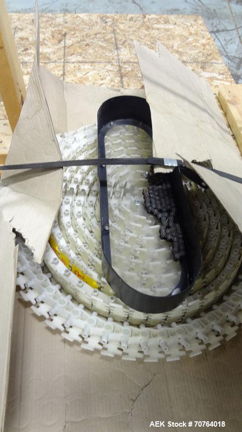 Used Flexlink 20 Conveyor. Counterclock with 10" radius. 3-1/4" flexible belt. 3-1/4" Delrin tabletop chain.