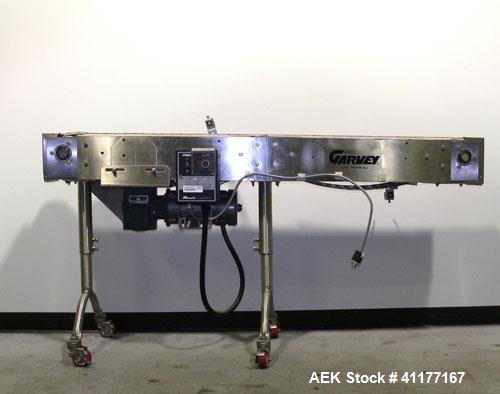 Used Garvey Table Top Conveyor, Model 9600, stainless steel. 6" wide x 72" long belt. Driven by a 1/2 hp, 90 volt, 1750 rpm DC motor. Has variable speed control. Mounted on casters.