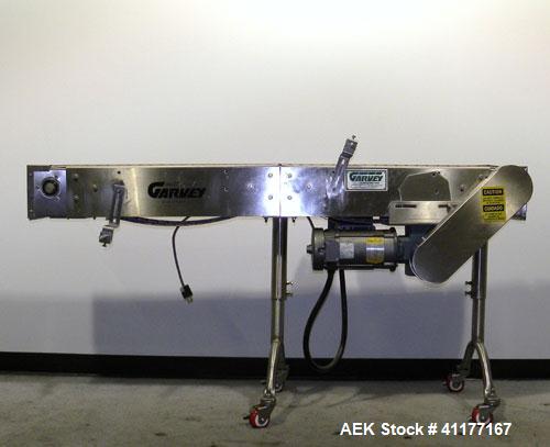 Used Garvey Table Top Conveyor, Model 9600, stainless steel. 6" wide x 72" long belt. Driven by a 1/2 hp, 90 volt, 1750 rpm DC motor. Has variable speed control. Mounted on casters.