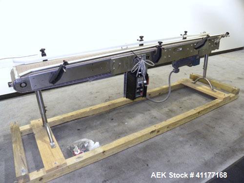 Used Garvey 9600 Series Tabletop Chain Conveyor. 7 1/2" wide X 96" long belt. Driven by a 1/2 hp, 90 volt, 1750 rpm DC gearmotor with a Reliance drive. All stainless steel frame and adjustable legs.