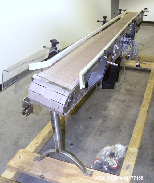 Used Garvey 9600 Series Tabletop Chain Conveyor. 7 1/2" wide X 96" long belt. Driven by a 1/2 hp, 90 volt, 1750 rpm DC gearmotor with a Reliance drive. All stainless steel frame and adjustable legs.