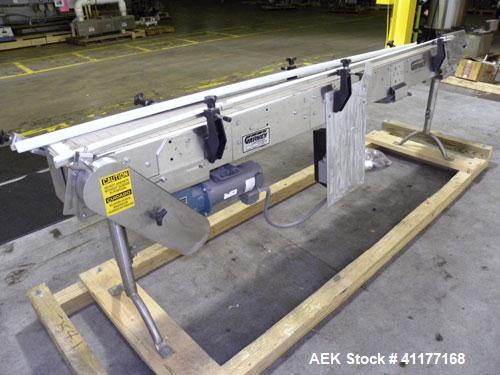 Used Garvey 9600 Series Tabletop Chain Conveyor. 7 1/2" wide X 96" long belt. Driven by a 1/2 hp, 90 volt, 1750 rpm DC gearmotor with a Reliance drive. All stainless steel frame and adjustable legs.
