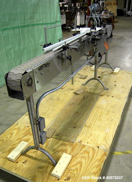 Used Garvey Conveyor, plastic belt 4 1/2" wide x 106" long. Driven by a 1/4 hp, 90 volt, 1750 rpm DC gearmotor, ratio 20 to 1. Includes a Reliance VS drive. Mounted on stainless steel legs.