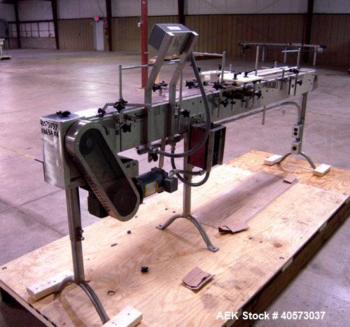 Used Garvey Conveyor, plastic belt 4 1/2" wide x 106" long. Driven by a 1/4 hp, 90 volt, 1750 rpm DC gearmotor, ratio 20 to 1. Includes a Reliance VS drive. Mounted on stainless steel legs.