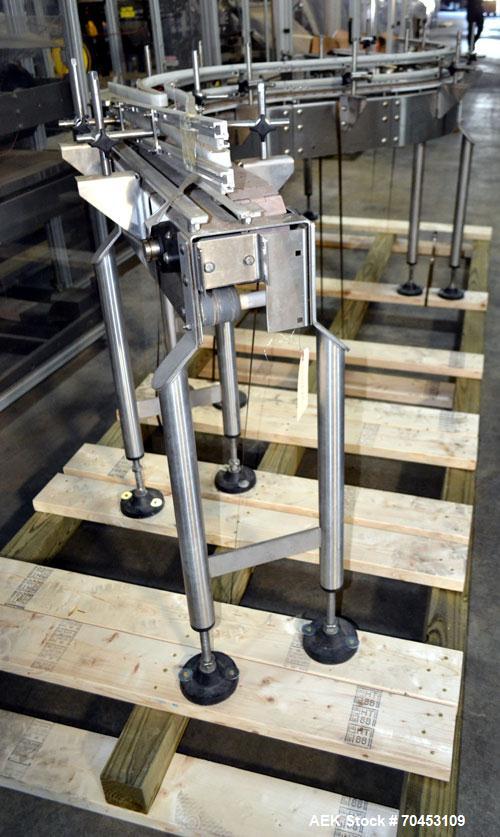 Used Stainless Steel Table Top Chain Conveyor. "S" Shaped unit with s/s frame and 3-1/4"W delrin chain conveyor.