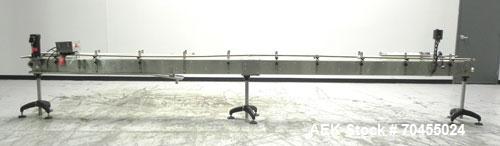 Used Inline Filling Systems Table Top Belt Conveyor. 256"L (21" 4"L) x 4-1/2" w delrin TT chain. Includes a 3/4 hp DC motor with speed controller 256"L (21" 4"L)   Mounted on a stainless steel frame....