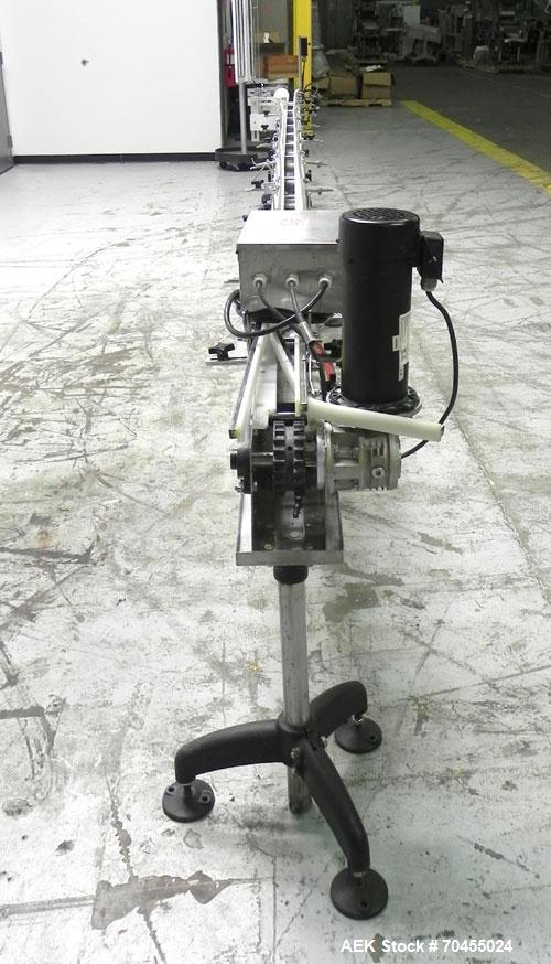 Used Inline Filling Systems Table Top Belt Conveyor. 256"L (21" 4"L) x 4-1/2" w delrin TT chain. Includes a 3/4 hp DC motor with speed controller 256"L (21" 4"L)   Mounted on a stainless steel frame....