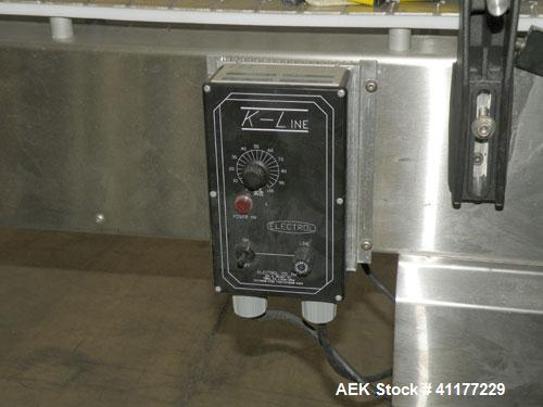 Used Kalish Table Top Chain Conveyor. 4 1/2" wide x 126" long stainless steel chain link belt. Driven  by a 1/2 hp, 90 volt, 1725 rpm DC motor with K-Line variable speed controls. 1/60/120V unit. Inc...