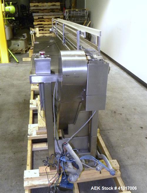 Used Table Top Belt Conveyor. (1) 3" wide x 102" long 421 stainless steel belt. 304 stainless steel frame. Machine footprint 106" long x 18" wide x 44" tall.