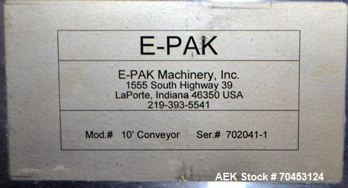 Used E-Pak Machinery Table Top Belt Conveyor. Approximate 4" wide x 112" long belt. Has motor. Mounted on a stainless steel frame. SELLING PRICE, AS IS, WHERE IS, SANFORD, NC.