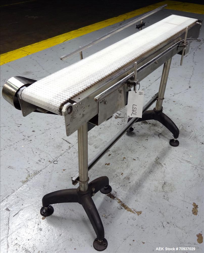 Used Packaging Dynamics Model PC-KVP5 Conveyor. Has 58" long x 8" wide Belt. Mounted on adjustable legs. Stainless steel construction.