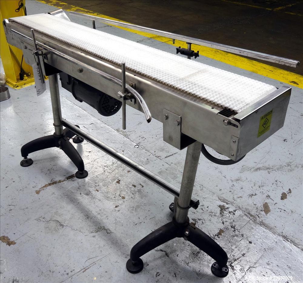 Used Packaging Dynamics Model PC-KVP5 Conveyor. Has 58" long x 8" wide Belt. Mounted on adjustable legs. Stainless steel construction.