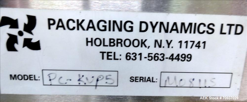 Used Packaging Dynamics Model PC-KVP5 Conveyor. Has 58" long x 8" wide Belt. Mounted on adjustable legs. Stainless steel construction.