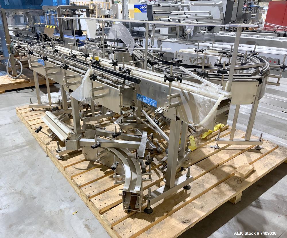 Used Volumetric Technologies Stainless Steel Frame Table Top Conveyor 4.5"Width. Has straight sections with 90 deg turns.