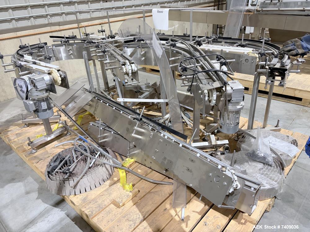Used Volumetric Technologies Stainless Steel Frame Table Top Conveyor 4.5"Width. Has straight sections with 90 deg turns.