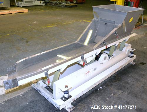 Used Deamco Vibrating Hopper Feeder, Model VHF-12X4X8-3, 304 Stainless Steel. 12" wide x 102’’ long trough. (2) Sections of clamp down top covers, 30’’ wide feed hopper. Driven by a 1hp, 3/60/230/460...