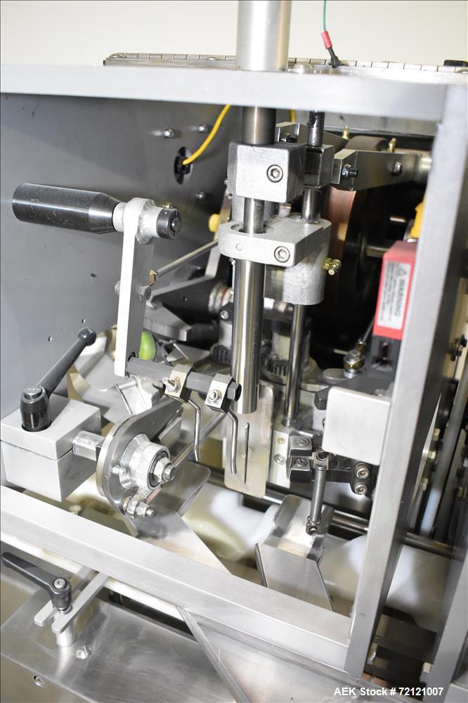 Used Lakso (IMA) Automatic Twin Head Cottoner, Model 300.