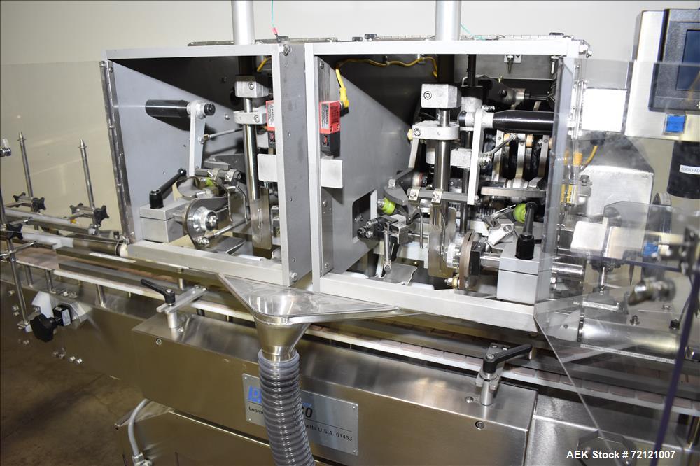 Used Lakso (IMA) Automatic Twin Head Cottoner, Model 300.