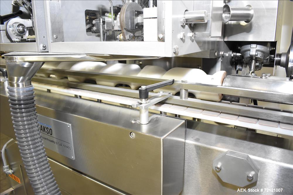 Used Lakso (IMA) Automatic Twin Head Cottoner, Model 300.