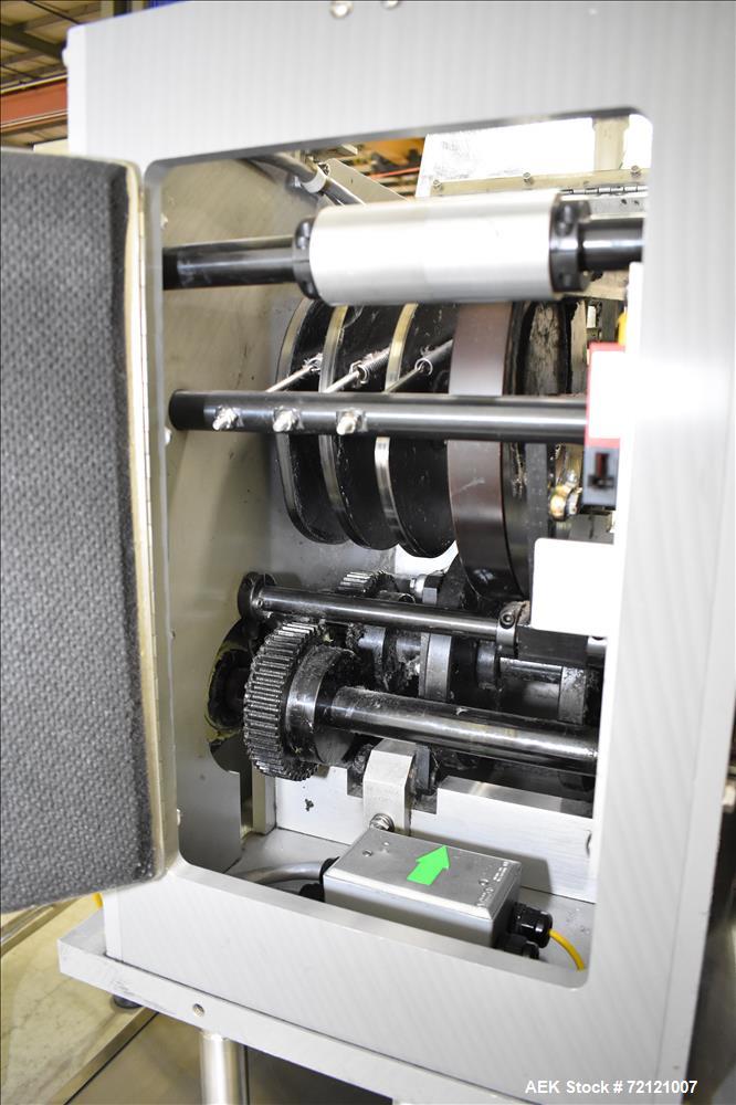 Used Lakso (IMA) Automatic Twin Head Cottoner, Model 300.