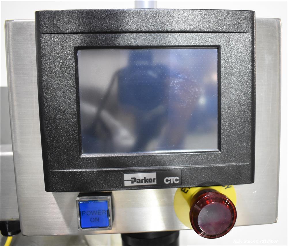 Used Lakso (IMA) Automatic Twin Head Cottoner, Model 300.