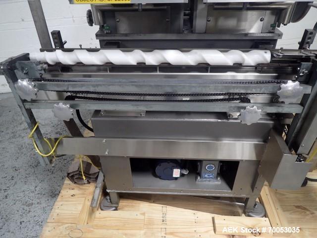 Used- Lakso twin head cotton inserter, model 300, speeds up to 300 bottles/minute, with timing screw and integrated slat con...
