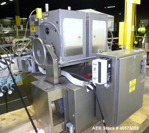 Used Lakso Cottoner 300. Fully automatic twin head cotton inserter capable of speeds up to 300 containers per minute with a maximum cotton weight range of 26 grams per yard and a cut length range of ...