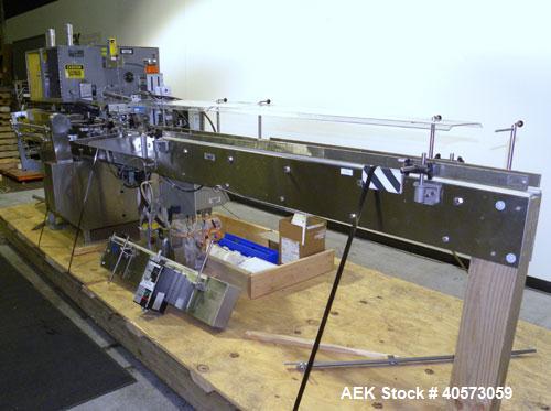 Used Lakso Cottoner 300. Fully automatic twin head cotton inserter capable of speeds up to 300 containers per minute with a maximum cotton weight range of 26 grams per yard and a cut length range of ...