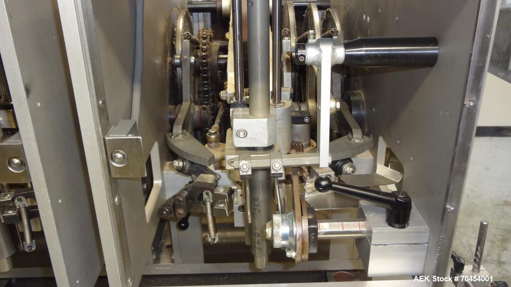 Used Lakso Model 300 / 450 Automatic Twin Head Cottoner