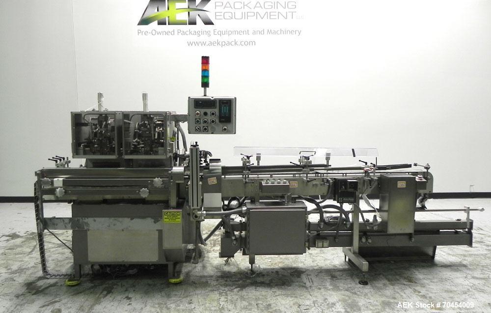 Used Lakso 450 Dual Station Inverted 'U' Cottoner. Machine has (2) cottoning heads for speeds up to 300 bottled per minute (depending on bottle size). Has a worm screw timing/alignment system. Comple...