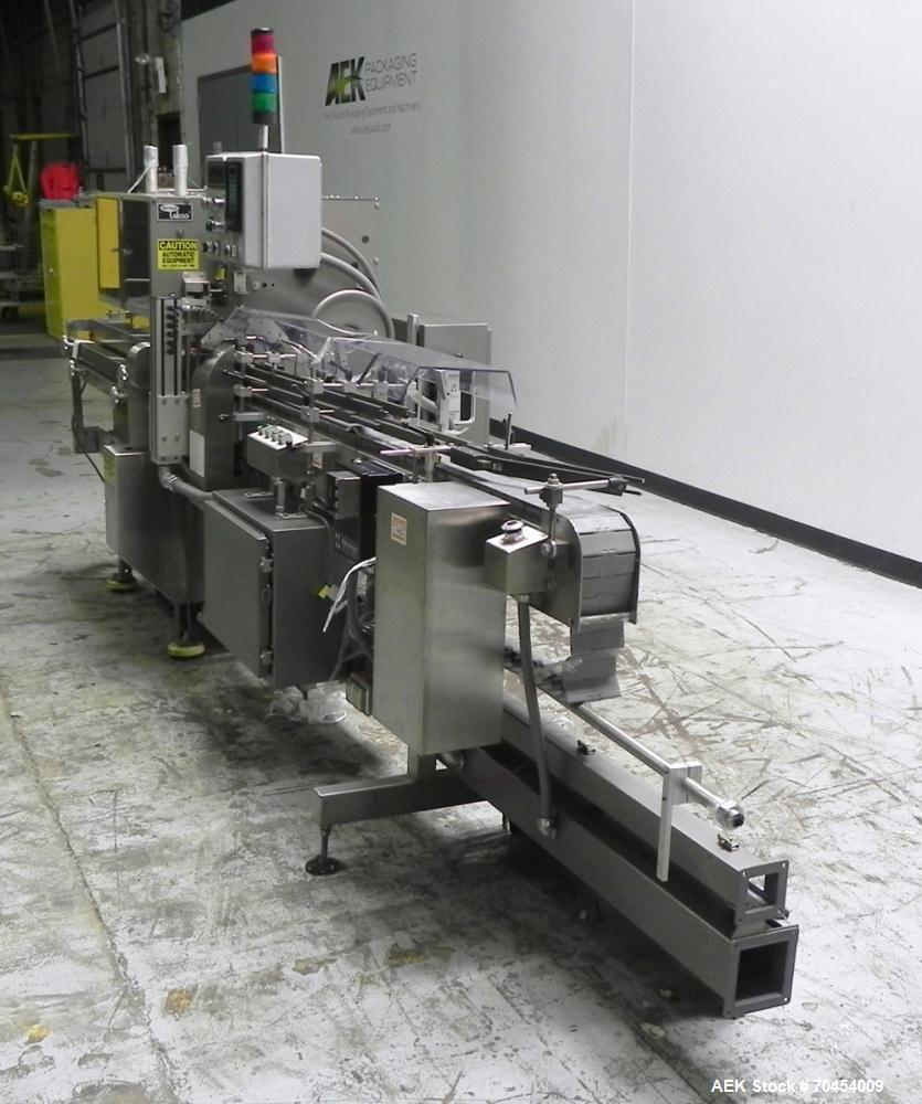 Used Lakso 450 Dual Station Inverted 'U' Cottoner. Machine has (2) cottoning heads for speeds up to 300 bottled per minute (depending on bottle size). Has a worm screw timing/alignment system. Comple...