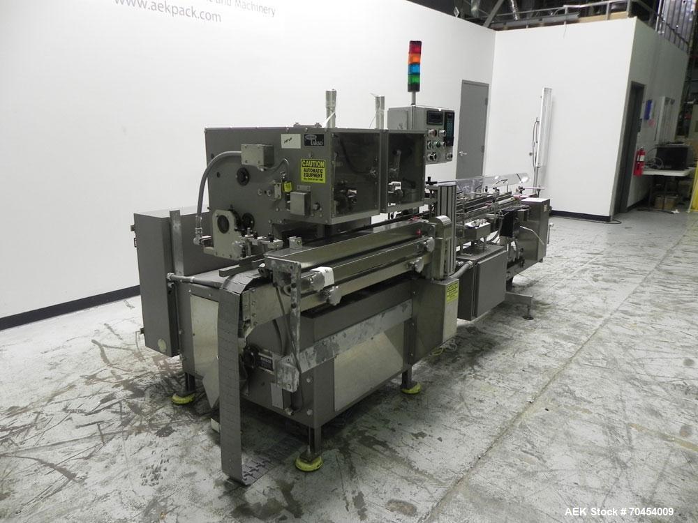 Used Lakso 450 Dual Station Inverted 'U' Cottoner. Machine has (2) cottoning heads for speeds up to 300 bottled per minute (depending on bottle size). Has a worm screw timing/alignment system. Comple...