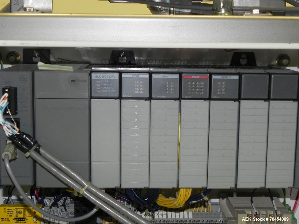 Used Lakso 450 Dual Station Inverted 'U' Cottoner. Machine has (2) cottoning heads for speeds up to 300 bottled per minute (depending on bottle size). Has a worm screw timing/alignment system. Comple...