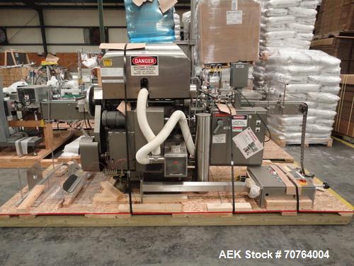 Used Lakso Model 71 Automatic Twin Head Cottoner capable of speeds up to 200 bottles per minute. Has 28" x 3-1/4" screw infeed. Can use natural or synthetic cotton up to 26 grams in inverted "U" conf...